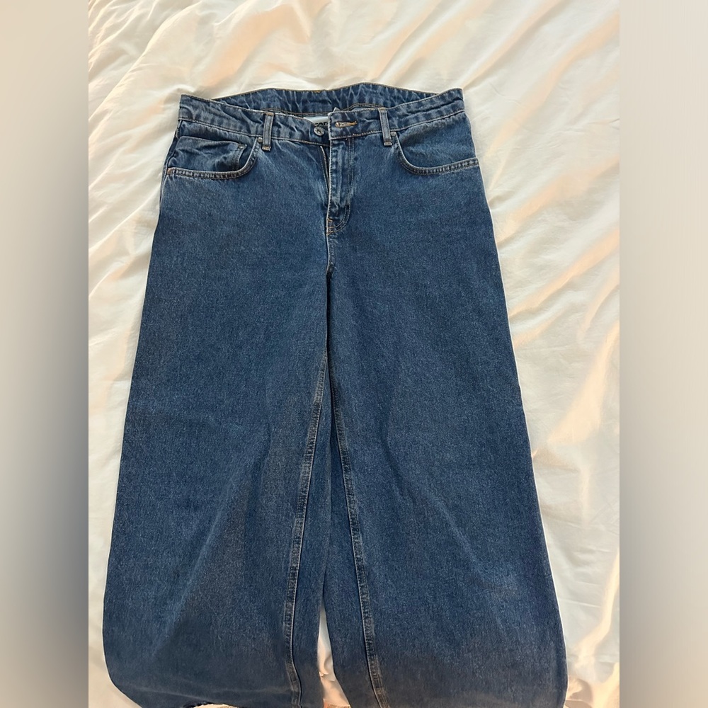 Ragged denim dark blue jeans